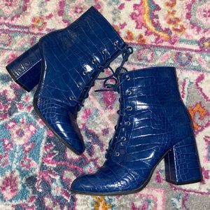 Forever 21 navy snakeskin lace up/ zipper booties. Women’s size 9.